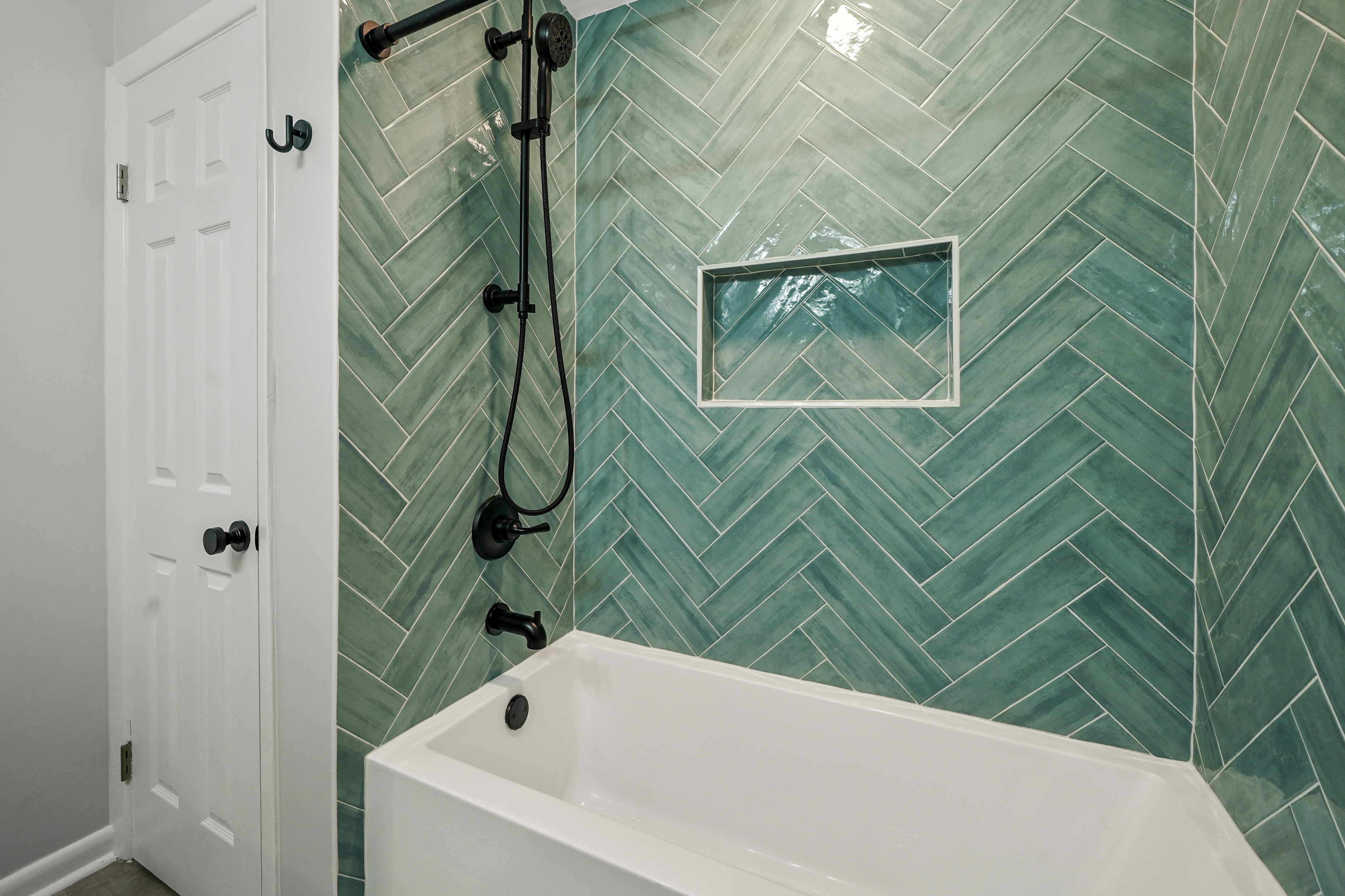 Modern bathroom with herringbone tile pattern
